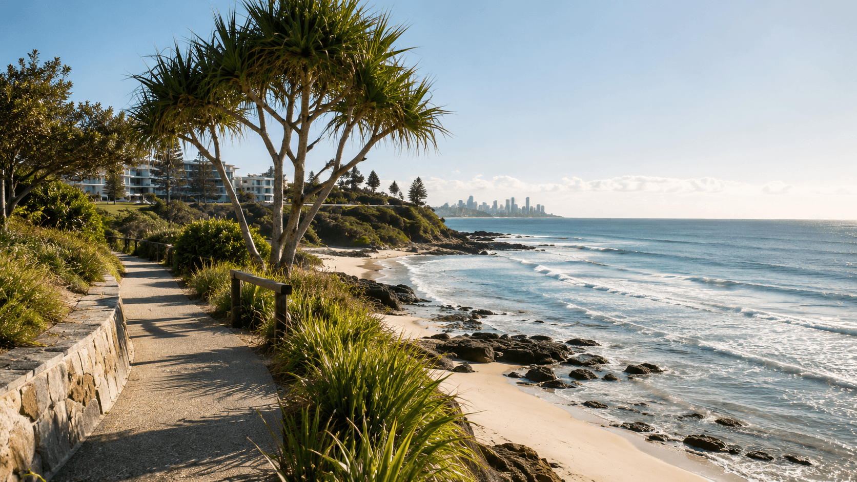 Gold Coast coastal walkway with ocean views, representing the lifestyle appeal of premium short-stay locations